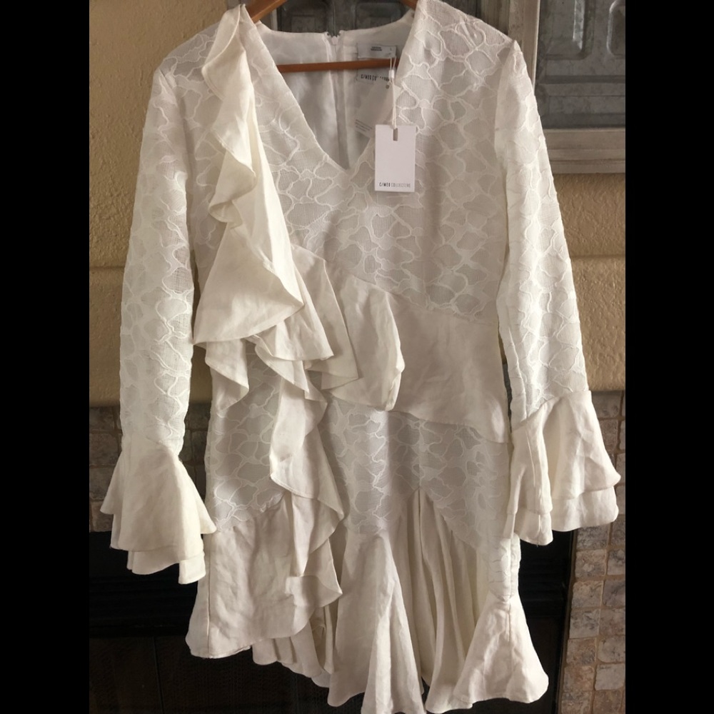 Dress white with lace and ruffles